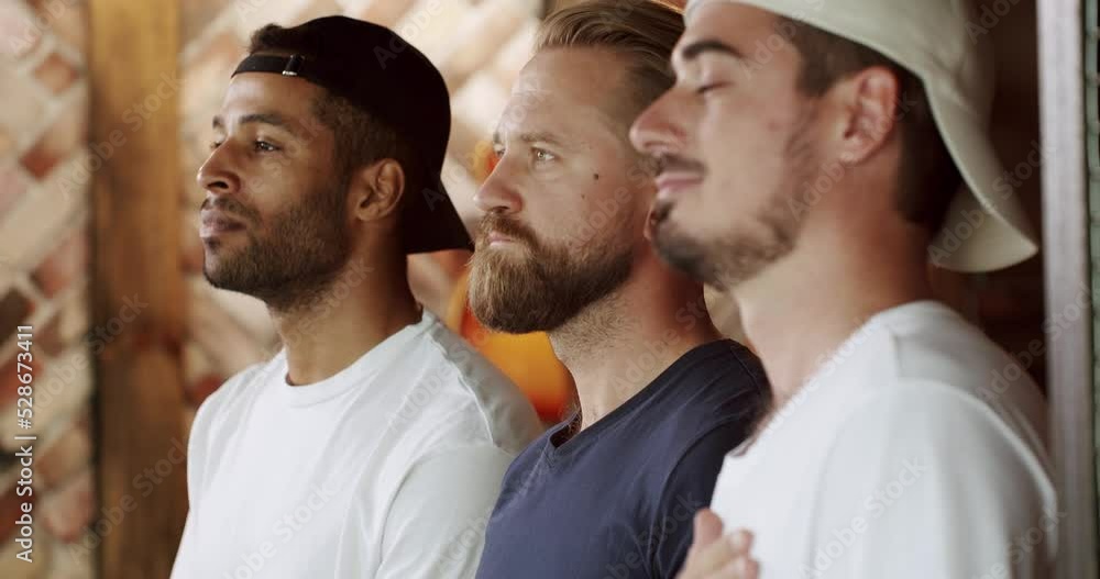 Soccer fans sing the national anthem before the game in sports bar