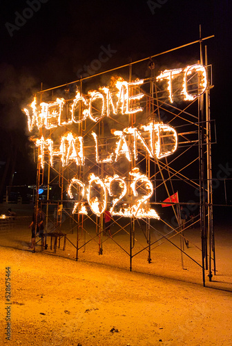 Welcome to Thailand 2022 full moon party in Haad Rin beach or Hat Rin in Ko Pha Ngan, Thailand photo