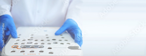 Banner with laboratory worker. Illumina next generation sequencing. genetic engineering, genetic modification, designer baby and cloning concept. cancer screening and medical technology