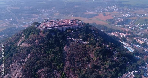 Aerial shot of sacred Hindu temple complex on a hill in Palani