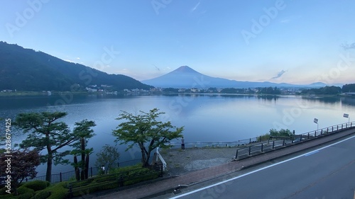 Magnificent Japanese traditional view, Mt Fuji at just after 5:30 am, the beautiful silhouette revealed in whole after cloudy evening the day before.  Photo taken year 2022 August 27th photo
