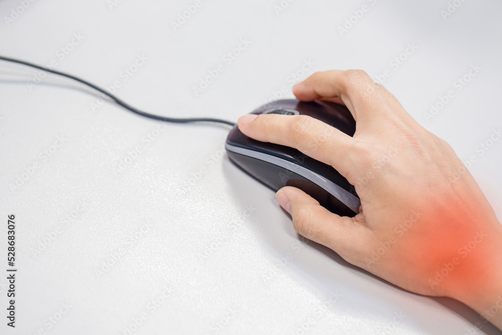 Wrist pain caused by using a computer mouse. Wrist pain caused by using a computer mouse.