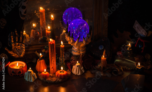 Halloween composition pumpkin orange candles  mystical design for home  interesting ideas for party  details of d  cor