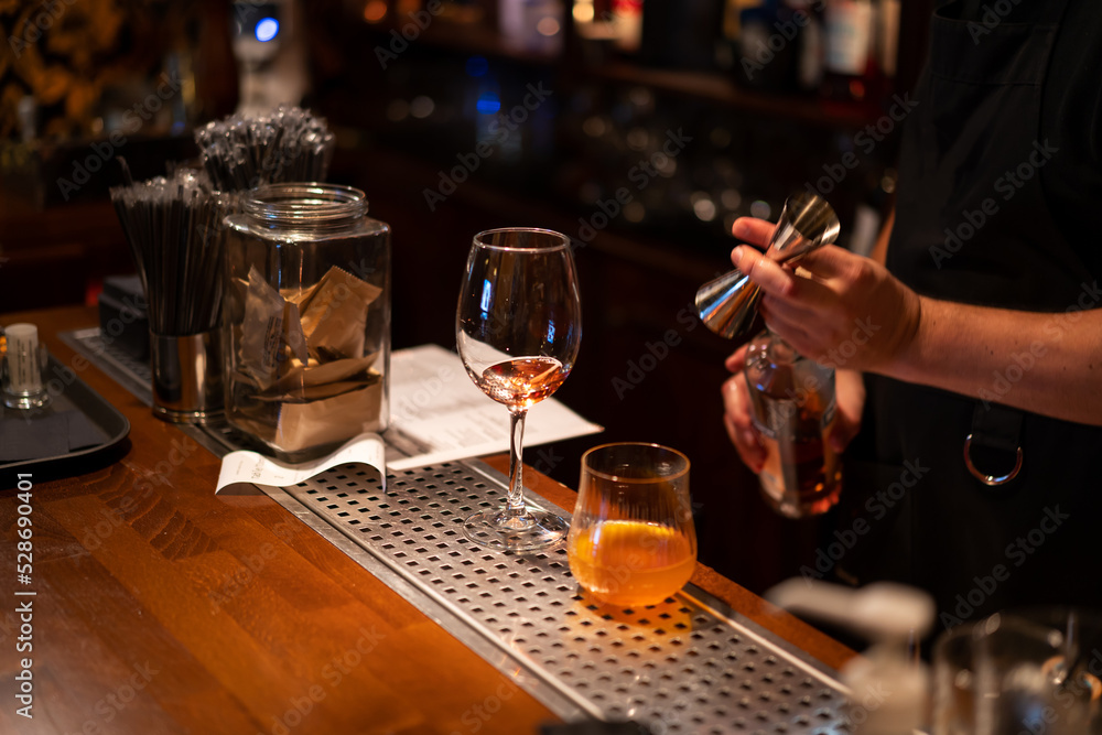 Bartender preparing cocktail in the bar
