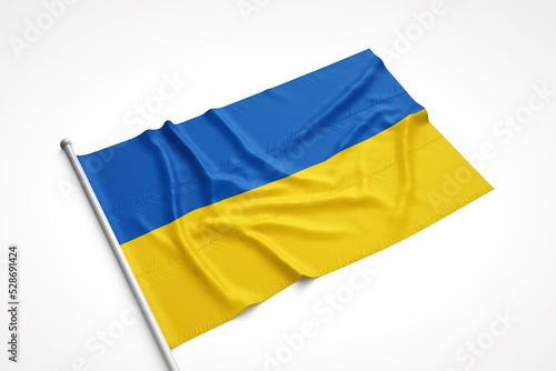 Ukrainian Flag is Laying on a White Surface