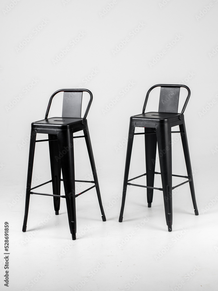 Black bar chairs on white background