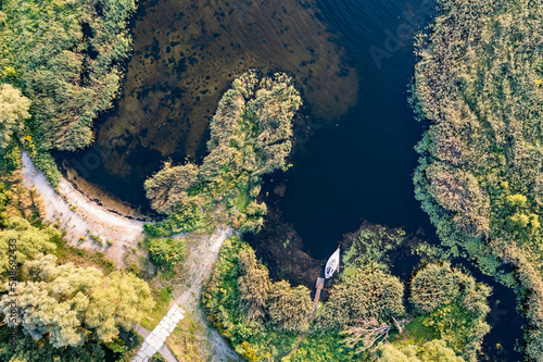 .Landscape with a drone on the lake and thickets.