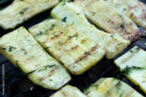 Grilled zucchini with seasoning and dill