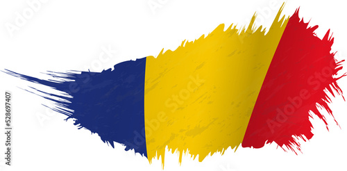 Flag of Romania in grunge style with waving effect. photo