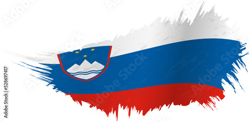 Flag of Slovenia in grunge style with waving effect. photo