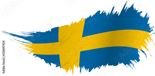 Flag of Sweden in grunge style with waving effect. photo