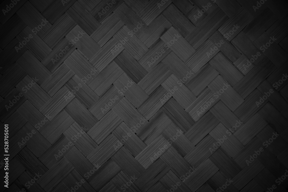Old black bamboo weave texture background, pattern of woven rattan mat in vintage style. Old black bamboo weave texture background, pattern of woven rattan mat in vintage style.