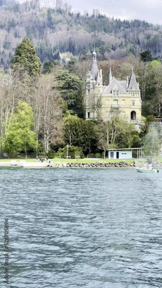 View of Castle on the Lake Thun, Switzerland. View of Castle on the Lake Thun, Switzerland.