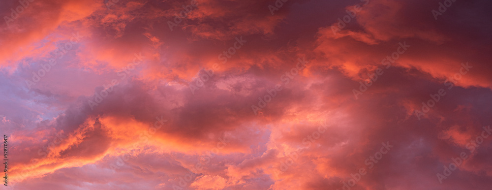 Red clouds on the sky at sunset