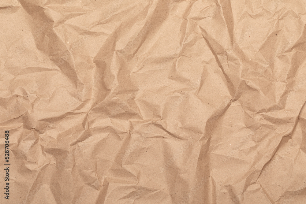 Obraz premium Crumpled kraft paper textured background