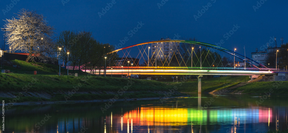 Fototapeta premium Colourful bridge at night lights