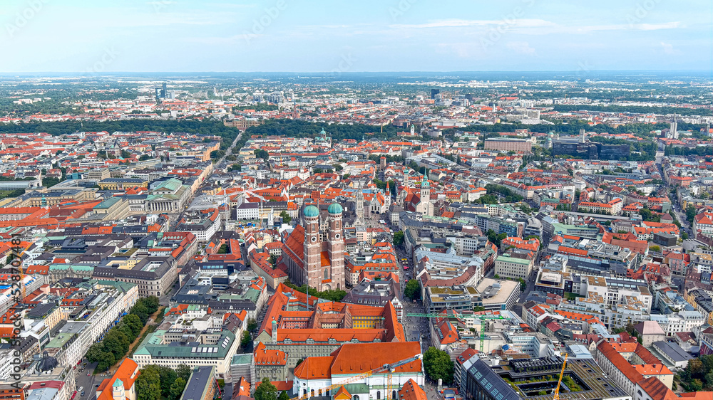 Munich, German München, city, capital of Bavaria Land (state), southern Germany. Aerial view of central building landmarks, Frauenkirche gothic church, St. Peter's, St. Lukas around Altstadt, Old Town