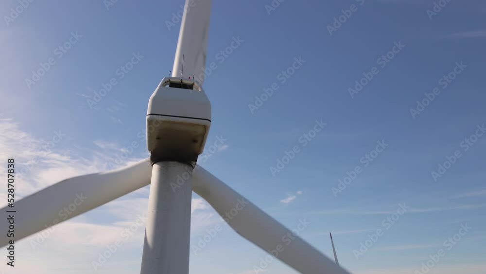 Green energy on wind turbines and wind turbines. Alternative energy sources and renewable energy sources. Power generation and generators of power plants.Wind farm and wind,environmental conservation Green energy on wind turbines and wind turbines. Alternative energy sources and renewable energy sources. Power generation and generators of power plants.Wind farm and wind,environmental conservation