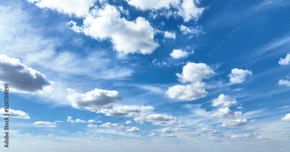 White clouds against blue sky background White clouds against blue sky background