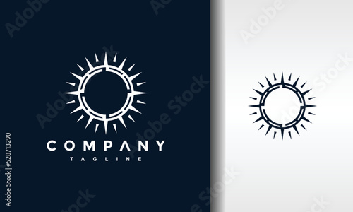 simple compass sun logo