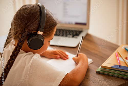 Fotografia, Obraz Autistic child writes homework on his own
