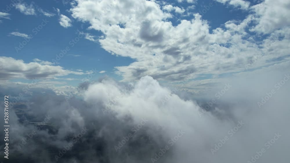 The view from the cockpit, flight among the clouds, blue sky, huge soft clouds. The view from the cockpit, flight among the clouds, blue sky, huge soft clouds.