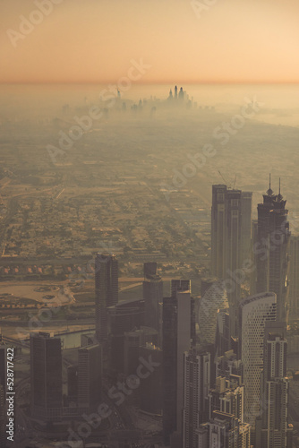 Dubai view from observation deck on 148 floor Burj Khalifa megatall skyscraper in United Arab Emirates
