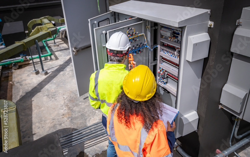 Photography The engineer checking and inspecting at MDB panel