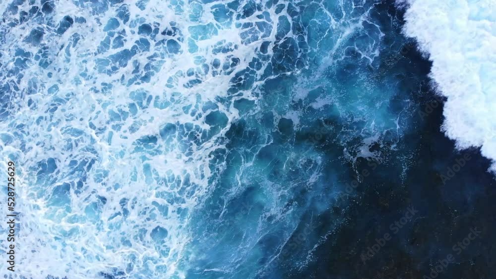 Beautiful texture of big power dark ocean waves with white wash. Aerial top view footage of surfers catch the wave. Fabulous sea tide on a stormy day
Beautiful texture of big power dark ocean waves with white wash. Aerial top view footage of surfers catch the wave. Fabulous sea tide on a stormy day