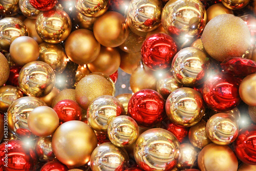 shiny round red and yellow Christmas balls for the new year holiday