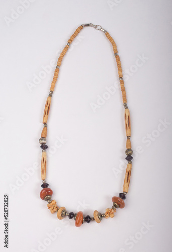women necklace made of colored stone and bead isolated on white background