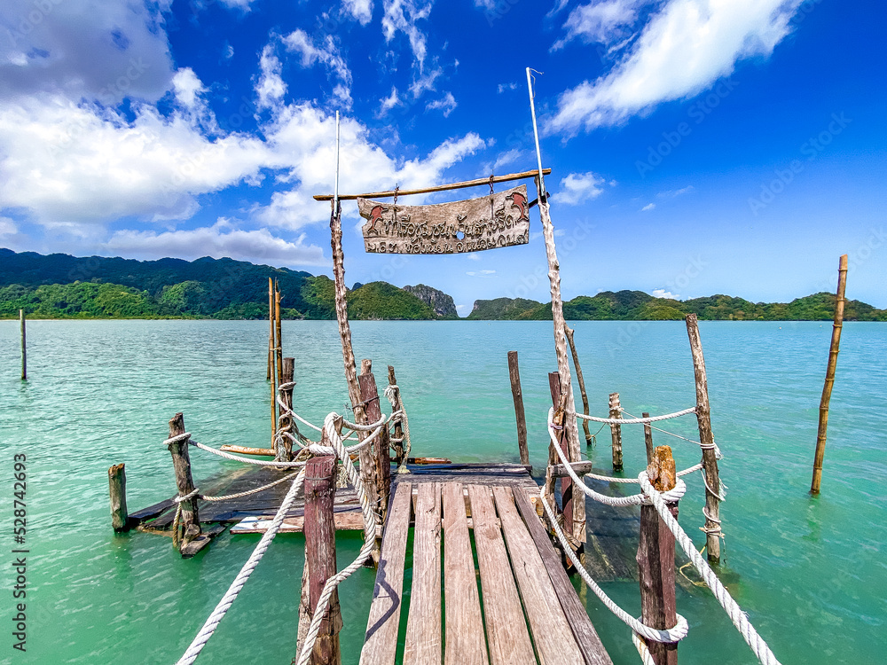 Wooden bridge at Ao Talet or Ta Lhet bay, Nakhon si Thammarat, Thailand Wooden bridge at Ao Talet or Ta Lhet bay, Nakhon si Thammarat, Thailand