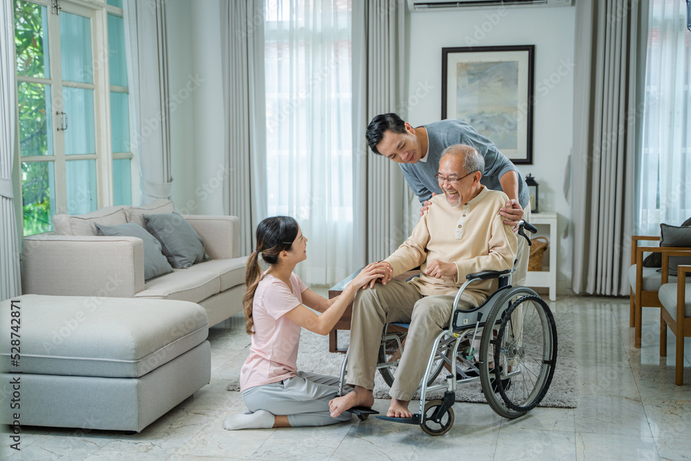 Family,Happiness,Generation,Home and people concept,Happy family in living room of house. Family,Happiness,Generation,Home and people concept,Happy family in living room of house.