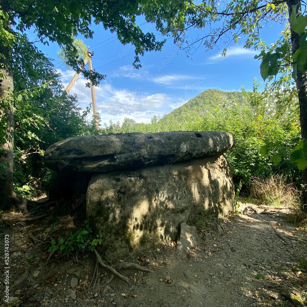 Dolmen is an ancient stone structure in the Caucasus Dolmen is an ancient stone structure in the Caucasus