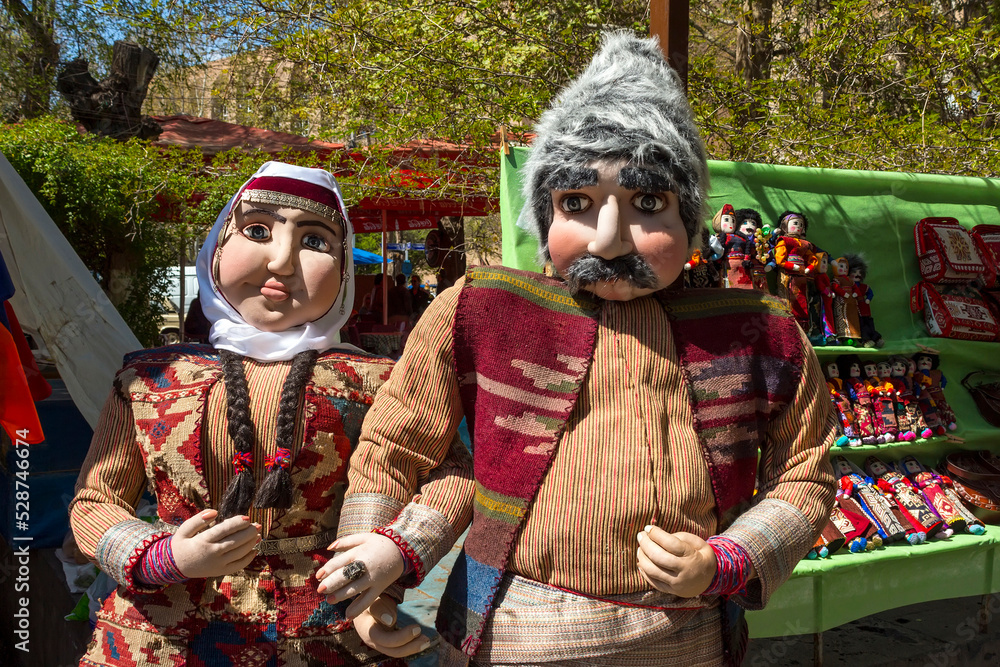Dolls on the vernissage in traditional Armenian clothes of Yerevan,Armenia