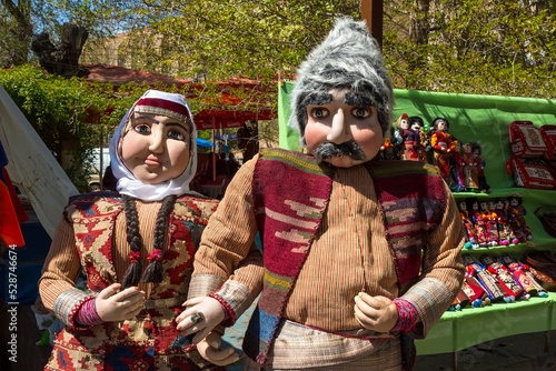 Dolls on the vernissage in traditional Armenian clothes of Yerevan,Armenia