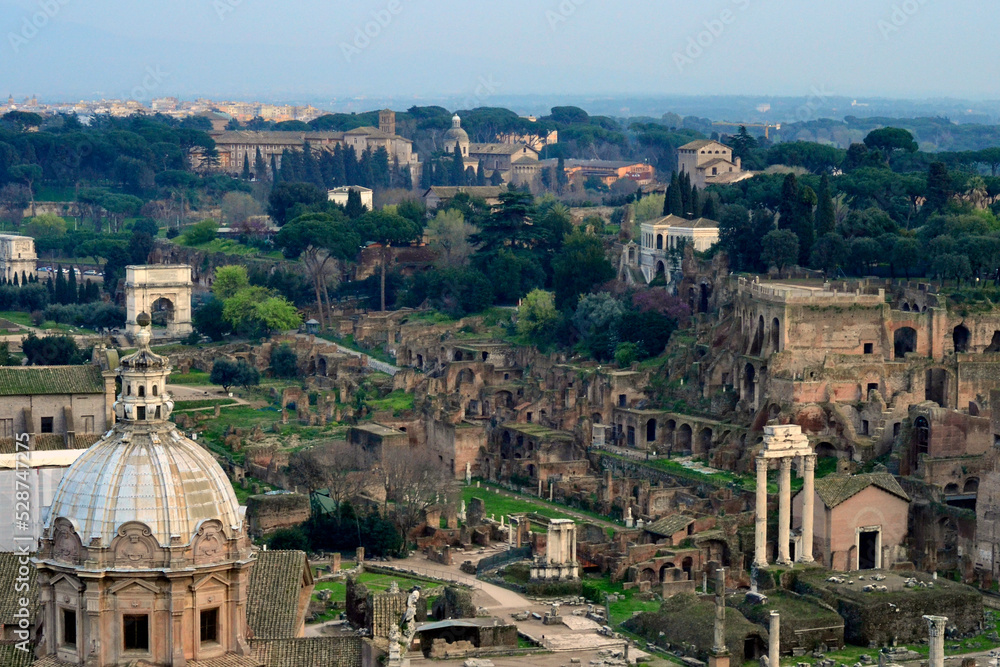 Panoramic view of ancient Roman ruins with cathedrals, arches, columns, gates, The Palatine Hill (Palatino), Rome, the capital of Italy. Best Roman landscapes, Best Roman scenery