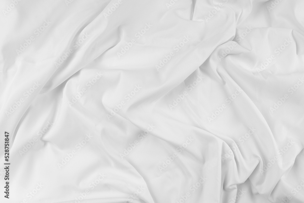 White fabric. luxurious white fabric texture background. Creases of satin, silk, and cotton.. White fabric. luxurious white fabric texture background. Creases of satin, silk, and cotton..