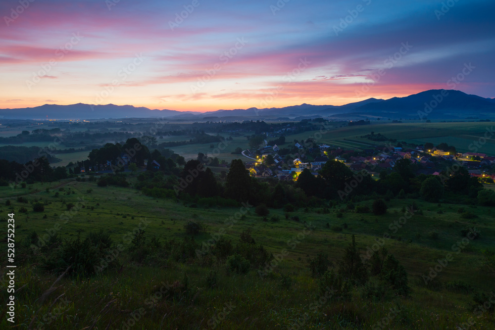 Socovce village and Velka Fatra mountain range, Slovakia.