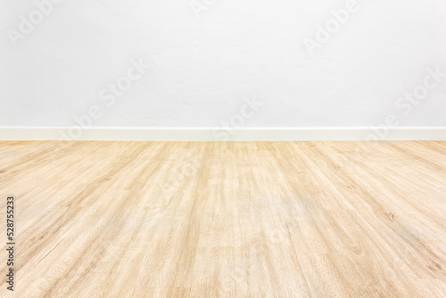 Wood floor with white wall background room © Rattanapon