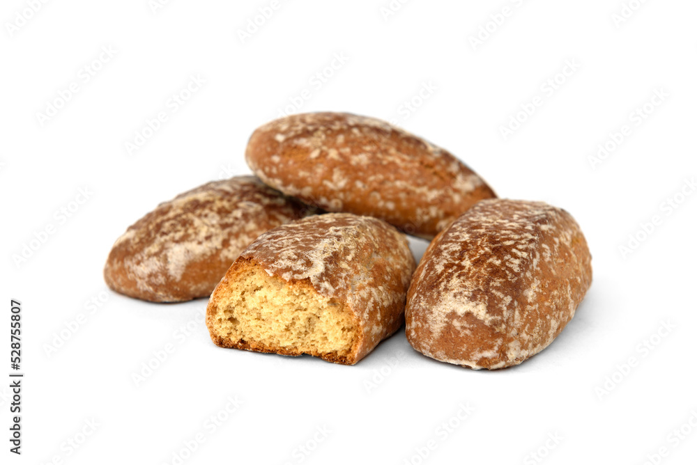 Pile of honey gingerbread cookies isolated on white background. Pile of honey gingerbread cookies isolated on white background.