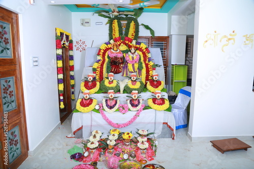 Bangalore, India 8th June 2022: Graha Pravesh. Grah or gruh Pravesh is a Hindu ceremony performed on the occasion of an individual's first time entering their new home. Hindu Hawan pooja Rituals.   photo