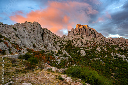Colorful sky from the setting sun over Tulovegrede in the Croatian Velebit mountains.