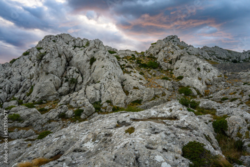 Colorful sky from the setting sun over Tulovegrede in the Croatian Velebit mountains.