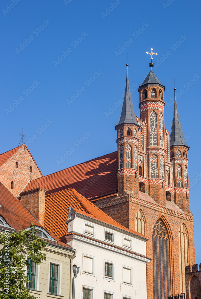 Old houses and the St. Mary church in Torun, Poland