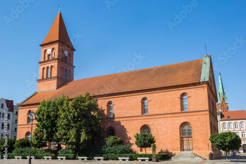 Holy Trinity church on the market square of Torun, Poland photo