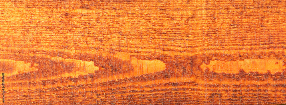 Naklejka premium Textured wooden brown backgroun.