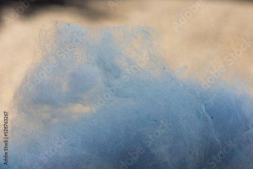 Blue cotton candy that looks like a cumulus fluffy cloud © Julia