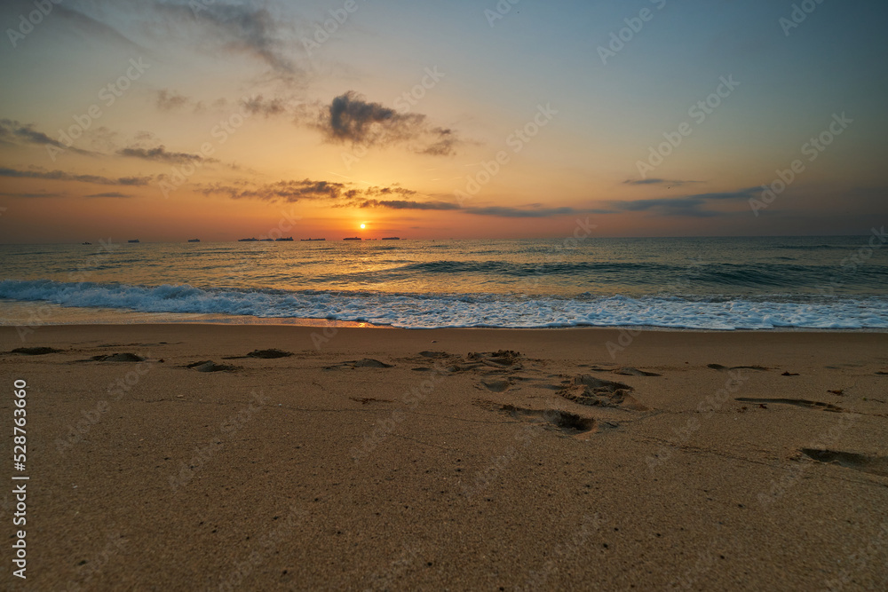 beautiful sunrise on a calm sea beautiful sunrise on a calm sea