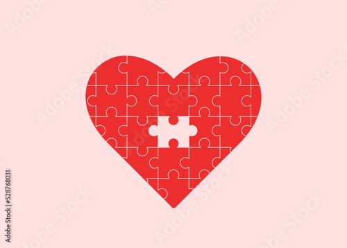 red heart in a jigsaw puzzle. concept of love, romantic feelings. search for a partner